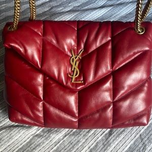 Red Saint Laurent large puffer shoulder bag.